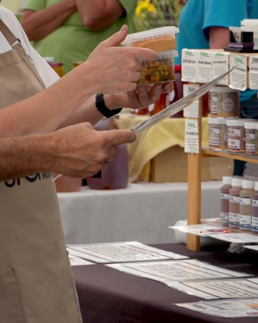 Hands with jars at the table